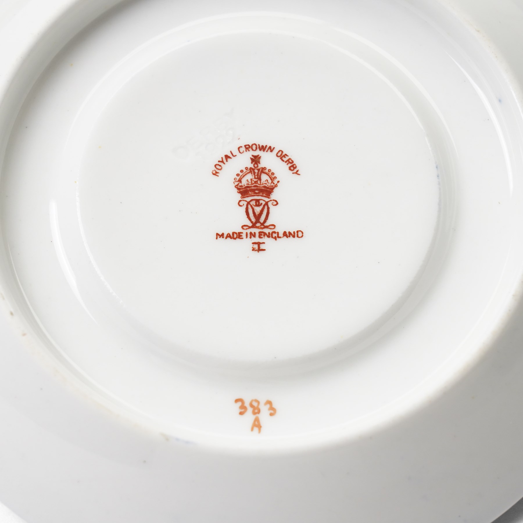 Six Royal Crown Derby coffee cans and saucers, pattern 383, together with six Aynsley coffee cans and saucers