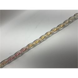 Victorian glass walking cane, probably Nailsea,  the wrythen twist shaft with ball knop, filled with alternating bands of pink, white and yellow sugar beads, L124cm