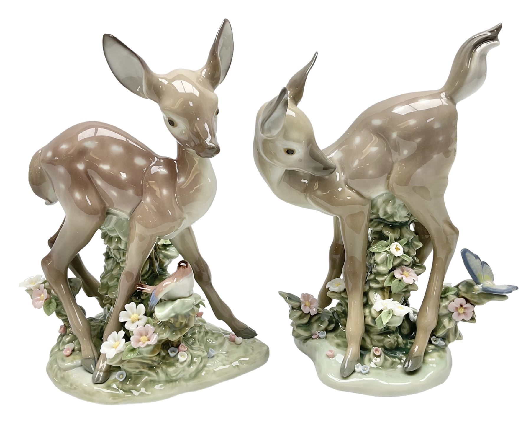 Two Lladro deer figures, comprising A Fawn and Friend no 5674 and Hi There no 5672, both with original boxes, largest example H14.5cm