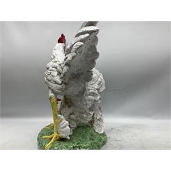 Italian pottery sculpture of a cockerel and hen, stood upon a green ground, H52cm