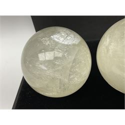 Set of three clear calcite spheres, D8cm