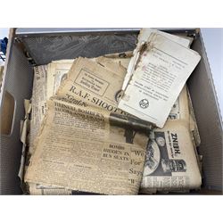 Collection of WWII newspapers, together with ration books, military badges and other WWII items  