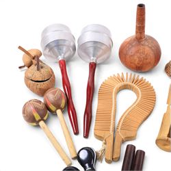 Collection of percussion instruments, including pair of metal maracas, cabasa, shekere, gourd maraca, guiro, wooden maracas, plastic castanets, etc