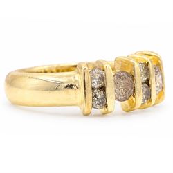 18ct gold fancy champagne / brown diamond ring, two round brilliant cut diamonds, spaced by six smaller round brilliant cut diamonds, stamped 750, total diamond weight approx 1.05 carat