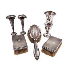 Early 20th century silver vase, of waisted form, with reed and bow border, upon knopped stem and filled circular stepped foot, hallmarked William Comyns & Sons, London 1911, H15cm, together with pair of Indian silver trumpet vases, with chased and embossed floral decoration, a pair of silver mounted clothes brushes, hallmarked Deakin & Francis Ltd, Birmingham 1946  and a 1920s silver mounted hairbrush, hallmarked W J Myatt & Co, Birmingham 1922