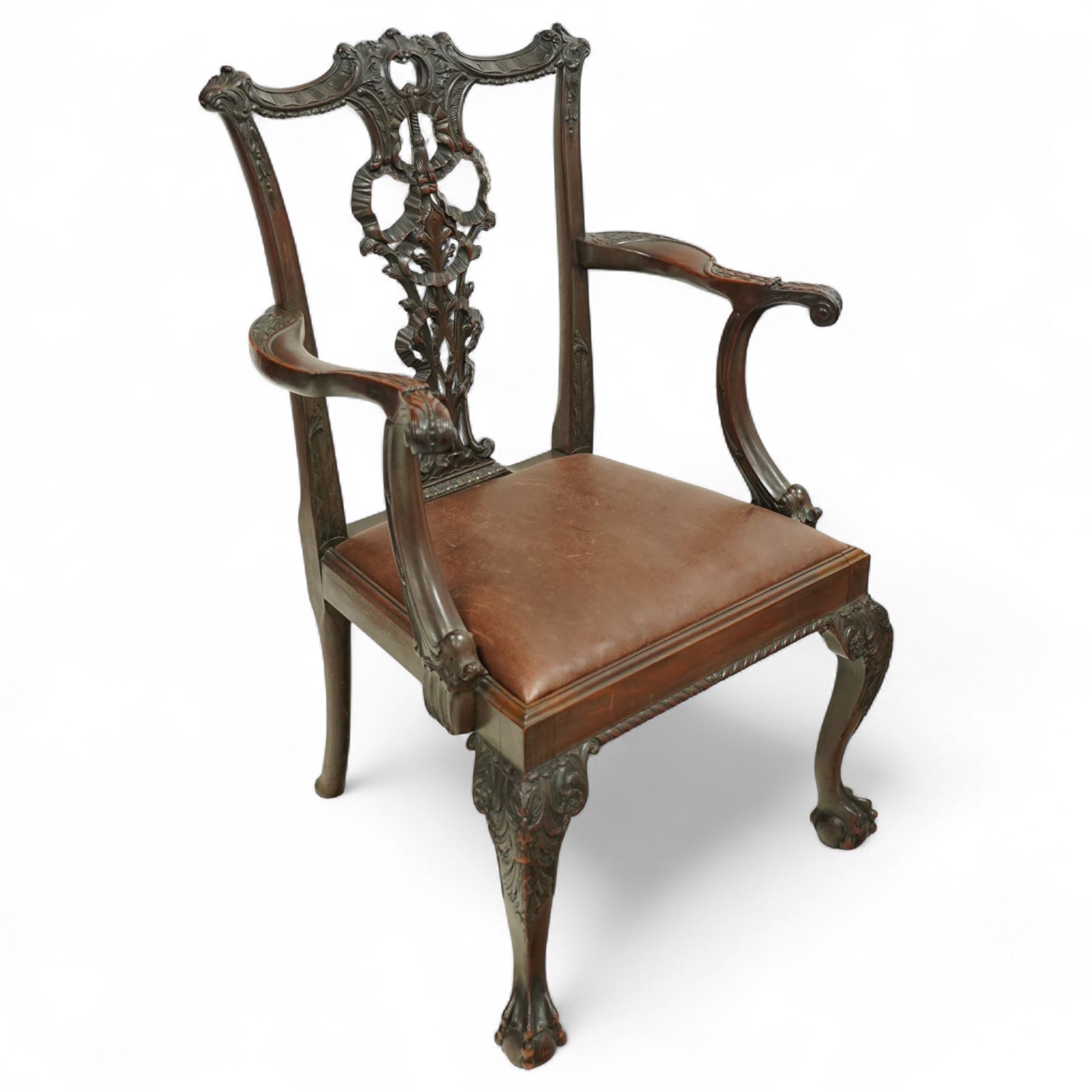 Set of eight 20th century Chippendale design mahogany dining chairs, including two carvers, each with pierced ribbon back splat carved with acanthus leaves, drop-in leather upholstered seats, moulded seat rails, on cabriole legs with ball and claw feet