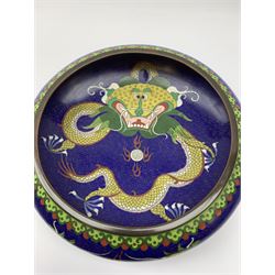 20th century Chinese Cloisonne bowl with inverted rim, centrally decorated with a Dragon on blue ground, four figure character mark beneath, D25cm 