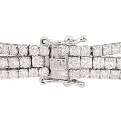 18ct white gold diamond three row bracelet, each four claw set with round brilliant cut diamonds, stamped, total diamond weight approx 7.70 carat