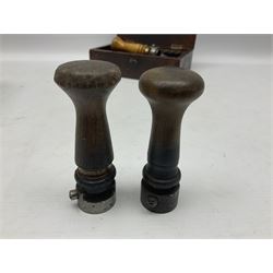 Two Post Office hand stamps 'Heversham Milnthorpe Cumbria' and 'Cimla Neath', together with two hand stamp bodies and various date numbers, housed in a fitted box