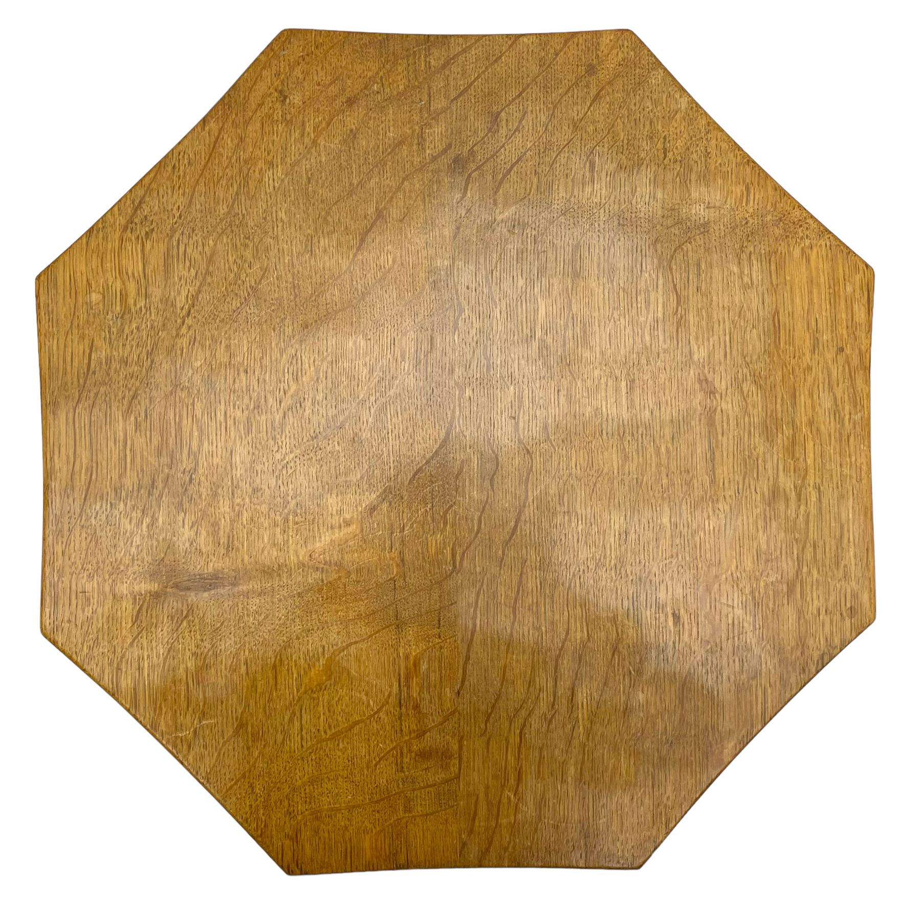 Mouseman - oak coffee table, octagonal adzed top on cruciform base, sledge feet, by the workshop of Robert Thompson, Kilburn