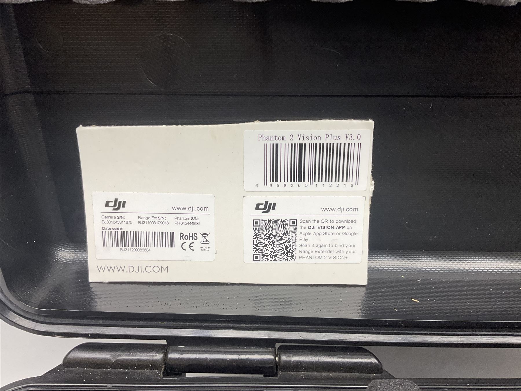 DJI Phantom 2 Vision Plus 3.0 drone, with controller, battery pack, blades, chargers and other accessories in fitted foam lined hard plastic case