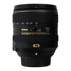 Three DSLR camera lenses, comprising Nikon Nikkor AF-S DX 35mm f/1.8G, boxed, Tokina AT-X Pro 11-16mm F28 Aspherical lens, boxed and Nikon Nikkor AF-S 16-80mm 1:2.8-4E ED lens and a 