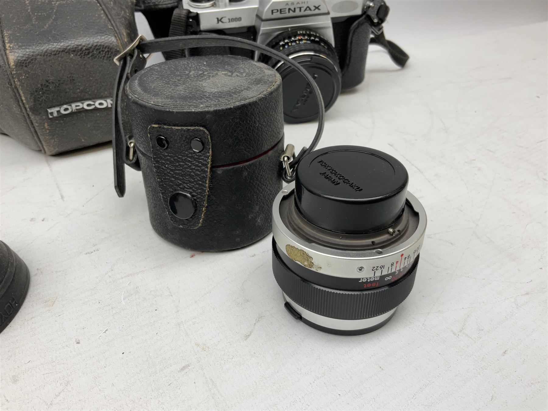 Quantity of cameras and lenses to include Topcon Unirex camera etc with cases