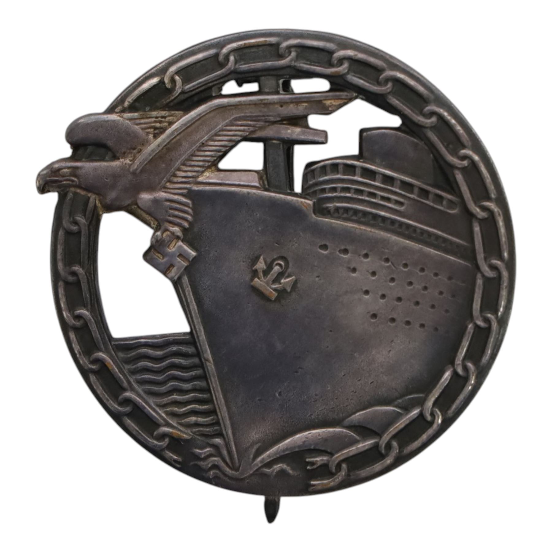 WWII German Kriegsmarine Blockade Breakers badge by Schwerin Berlin, marked on the reverse 'FEC OTTO PLACZEK BERLIN AUF.SCHWERIN BERLIN', H5cm