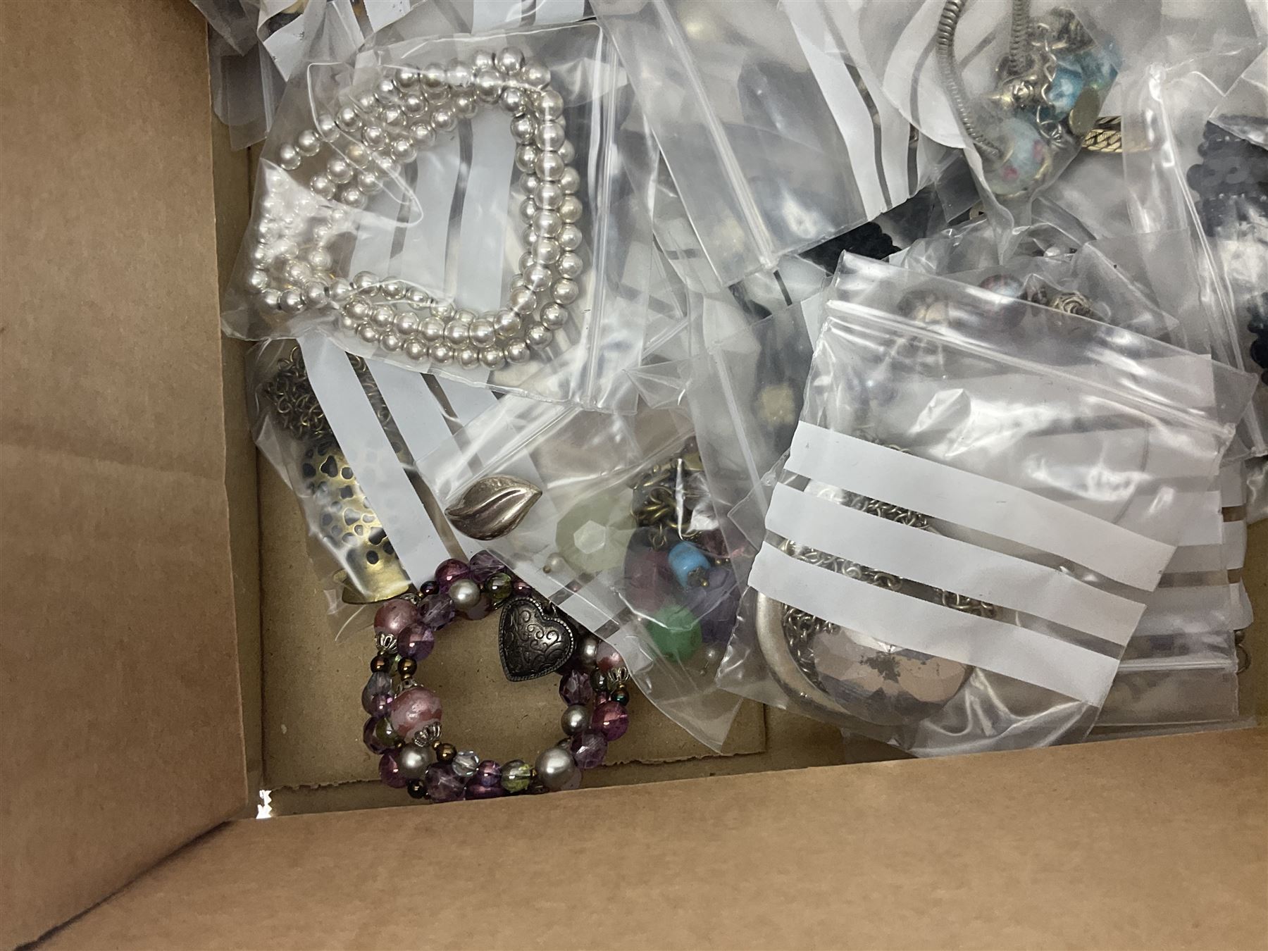 Silver necklace, compact mirror with lipstick holder and a collection of costume jewellery 