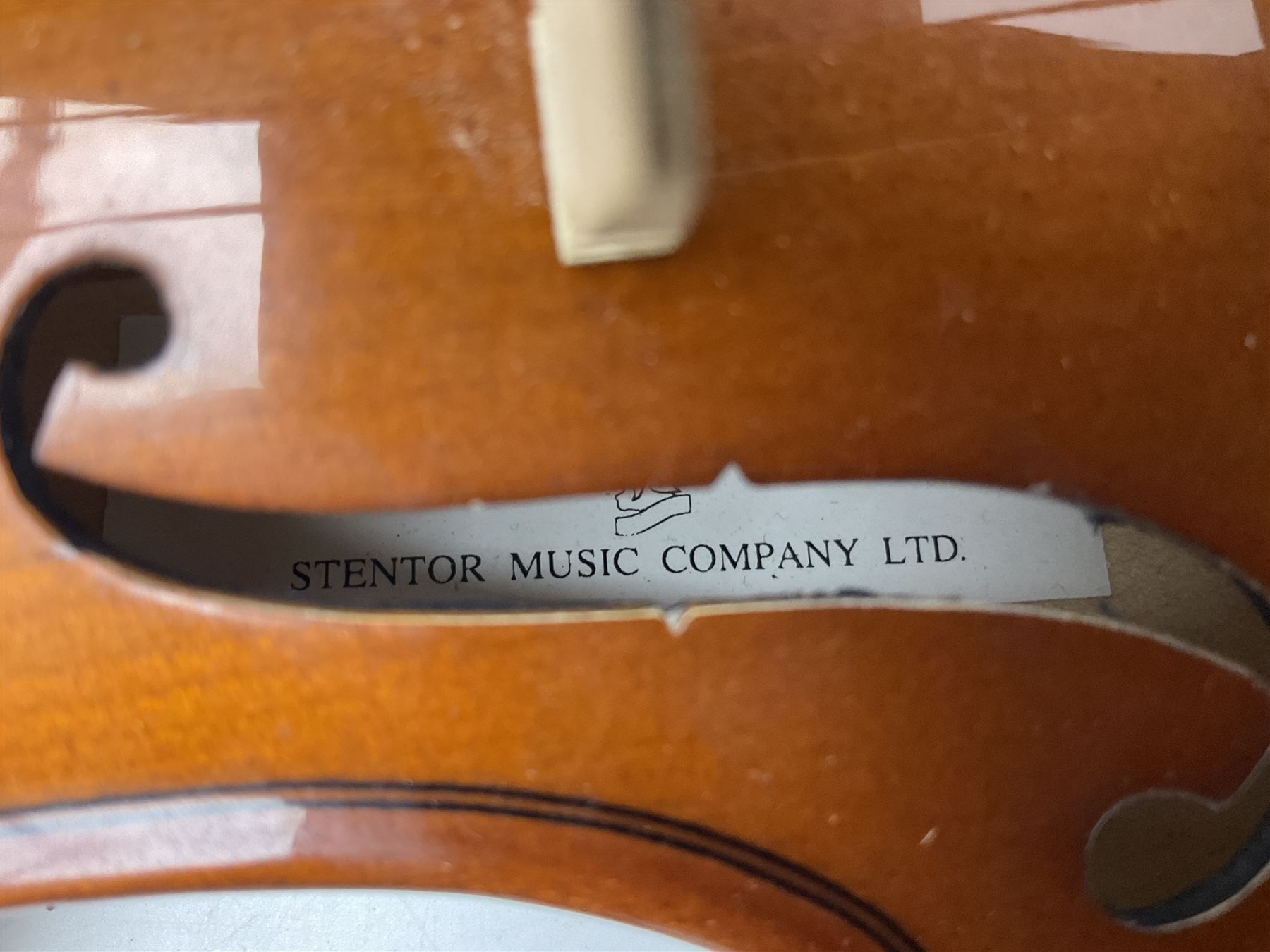 Four student violins - two Chinese three-quarter size with 33.5cm and 34cm two-piece backs; Stringers of Edinburgh quarter size with 28cm two-piece back; and Stentor quarter size with 28cm two-piece back; each in carrying case (4)