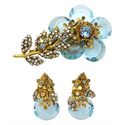 Miriam Haskell gilt blue crystal and paste stone set flower brooch and a similar pair of clip on earrings 