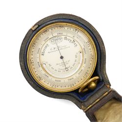 Victorian pocket barometer/altimeter by C.W. Dixey 'Optician to the Queen', brass with silvered dial, contained within a leather case