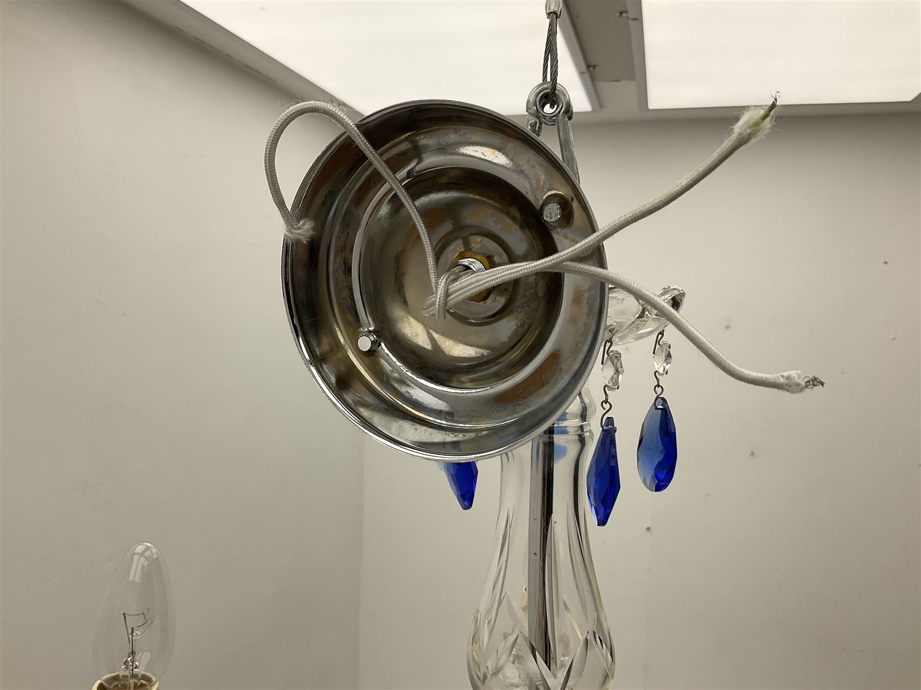 Glass four light chandelier, the baluster shaped central glass column supporting four curved branches with drip pans and blue glass drops, approx height excl fitting H50cm