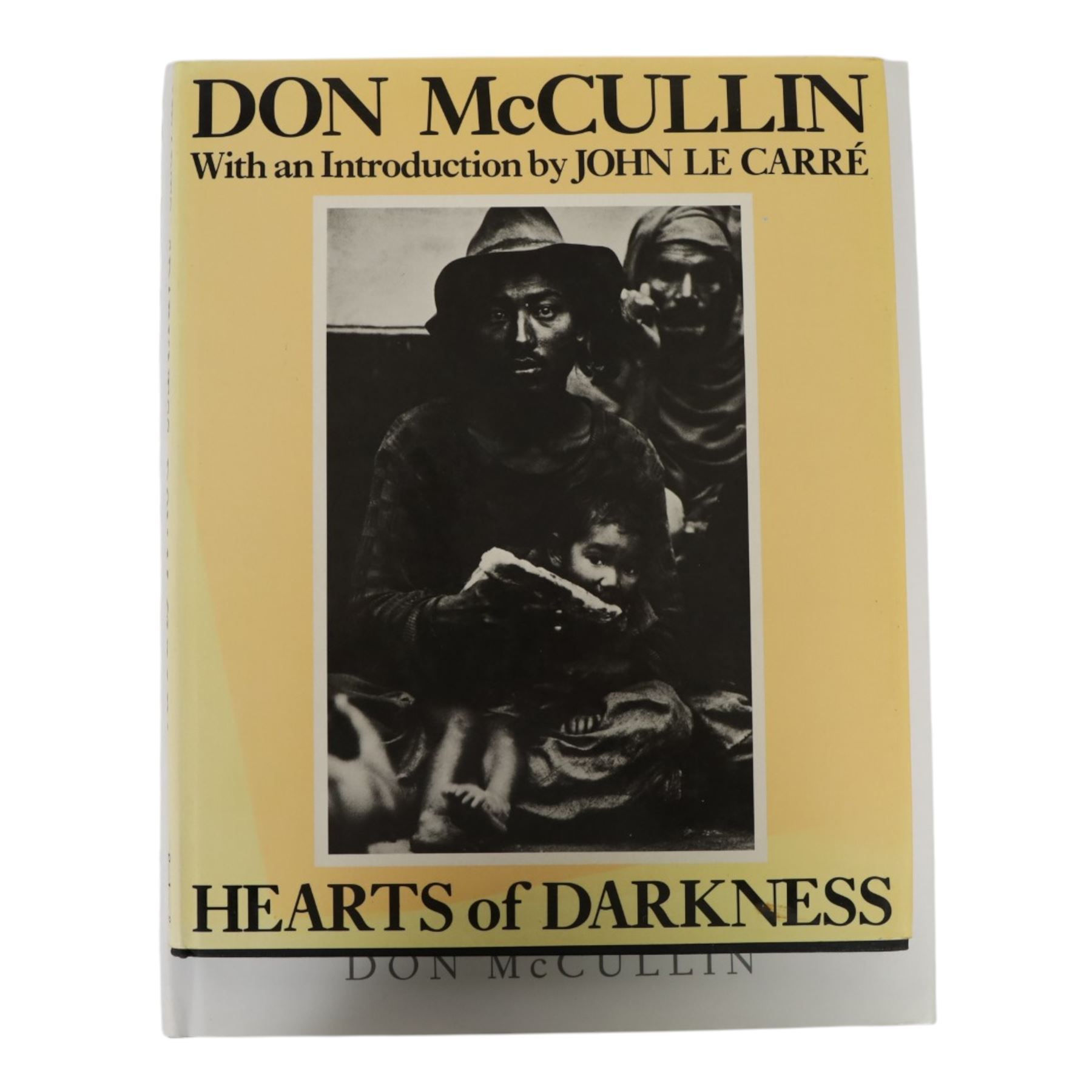 McCullin, Don: three hardback books, comprising 'Shaped by War', 'Hearts of Darkness' and a self titled example, together with a framed Times magazine cover depicting the photographer in black and white, signed to the left hand side