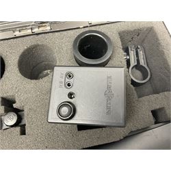 Two Nite-Site add-on kits in hard plastic carrying cases; one with charger