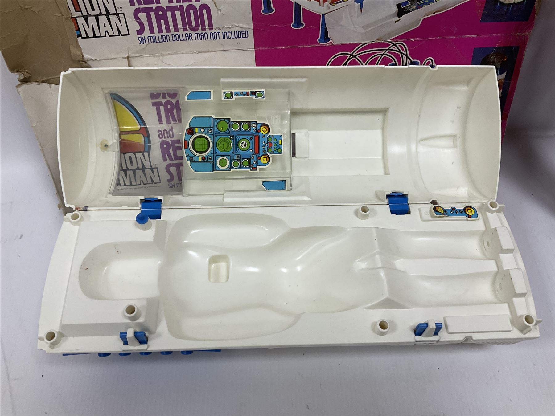 Six Million Dollar Man - two 1975 Bionic Transport and Repair Stations with related figures, further accessories and boxes