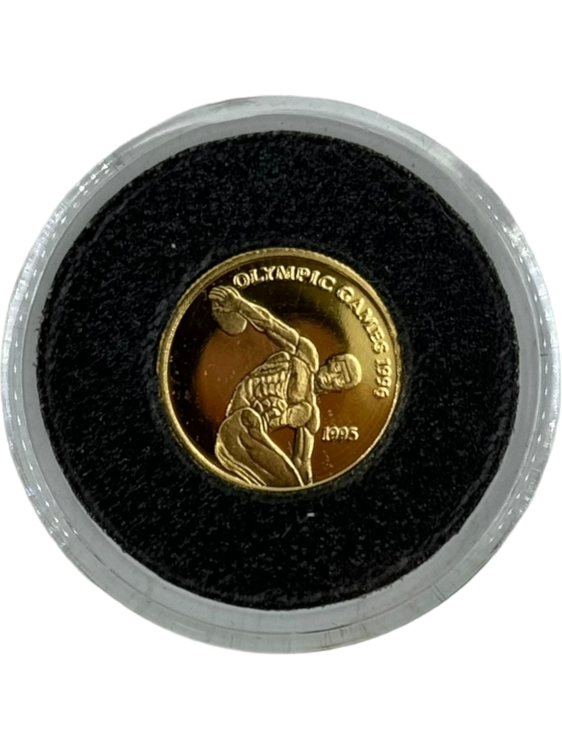 Four one twenty-fifth of an ounce 24 carat gold coins, from 'The Smallest Gold Coins of the World Collection', all with Westminster certificates (4)