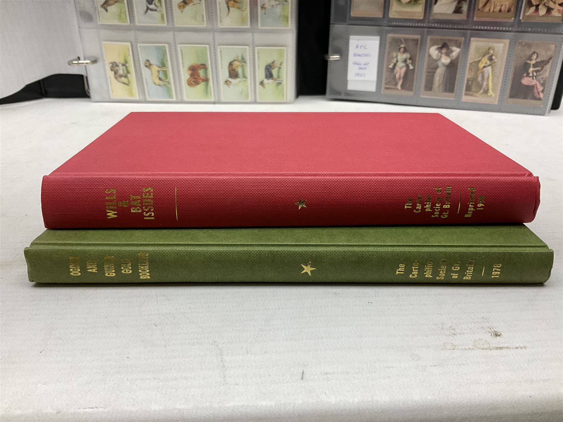 Quantity of mostly cigarette cards, housed in ring binder albums and loose, by Ardath, W.D. & H.O. Wills, John Player & Sons, The American Tobacco Co etc, including famous film stars, cinema stars, wild birds, poultry, dogs etc and various books or catalogues relating to cigarette card collecting, in one box