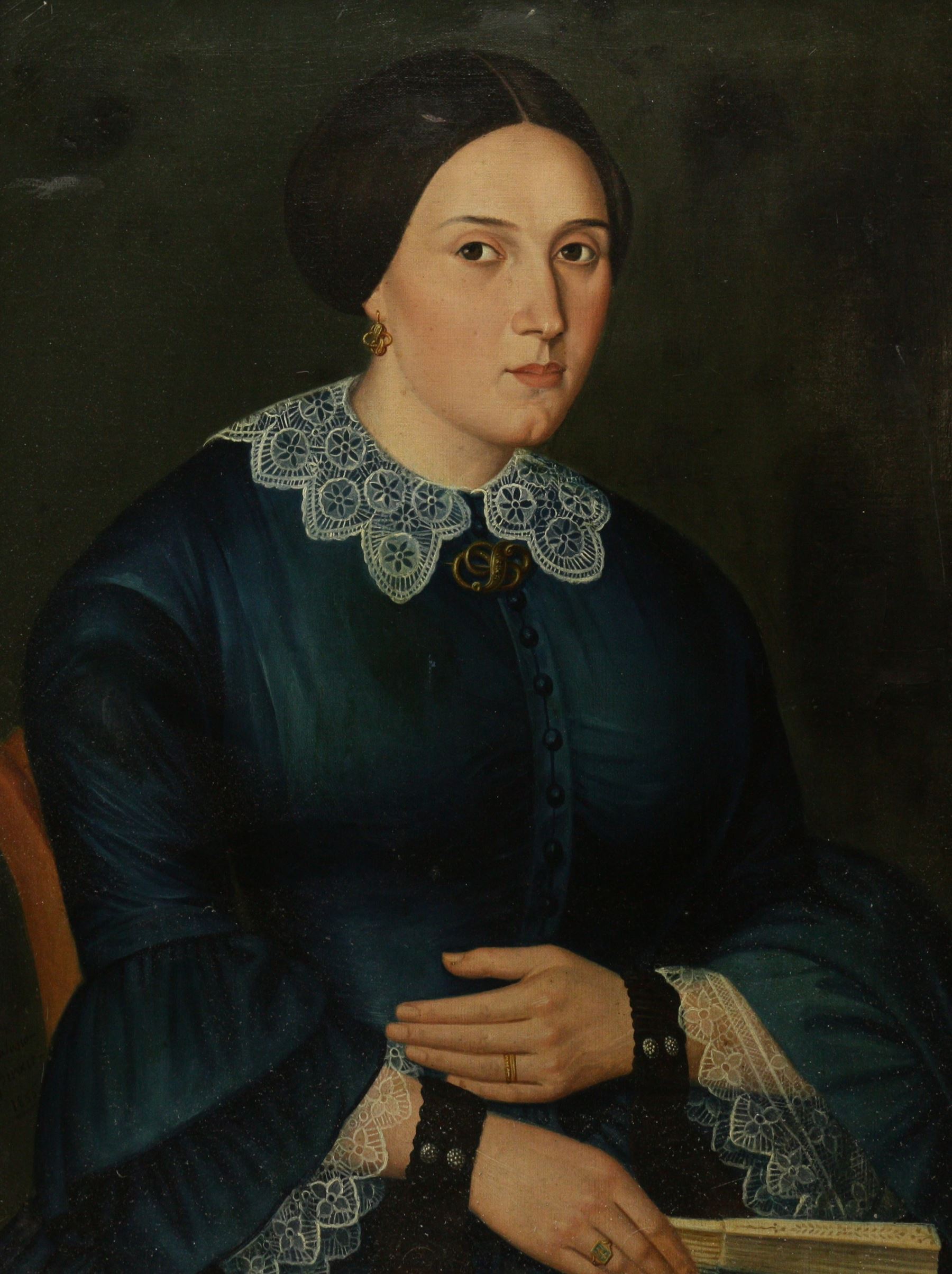 Manner of Ammi Phillips (American 1788-1865): Portrait of Lady in a Blue Dress, oil on canvas bearing inscription 'Galasso Pinxit 1855', 66cm x 50cm
Notes: Phillips was a self-taught artist who was constantly developing his skills as he moved around America, formulating his style to what was popular in an area. For this reason, he did not often sign his work and thus many of his portraits have been misattributed to other artists, particularly due to subtle changes in his technique and his own personal development in portraiture. Various features are instantly recognisable as in the style of Phillips - for instance the framing of the face using stark white collars, often in lace for women. The upright position of the sitter, the muted and dark tones used, and the setting of their dark eyes among round features can all be considered as signature characteristics of a Phillips portrait.