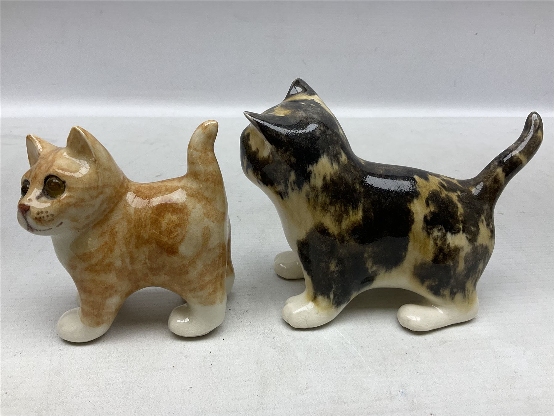 Two Winstanley figures of kittens, comprising tabby cat no 2 and ginger cat no 1, both with inset eyes and painted marks beneath, tallest H11cm