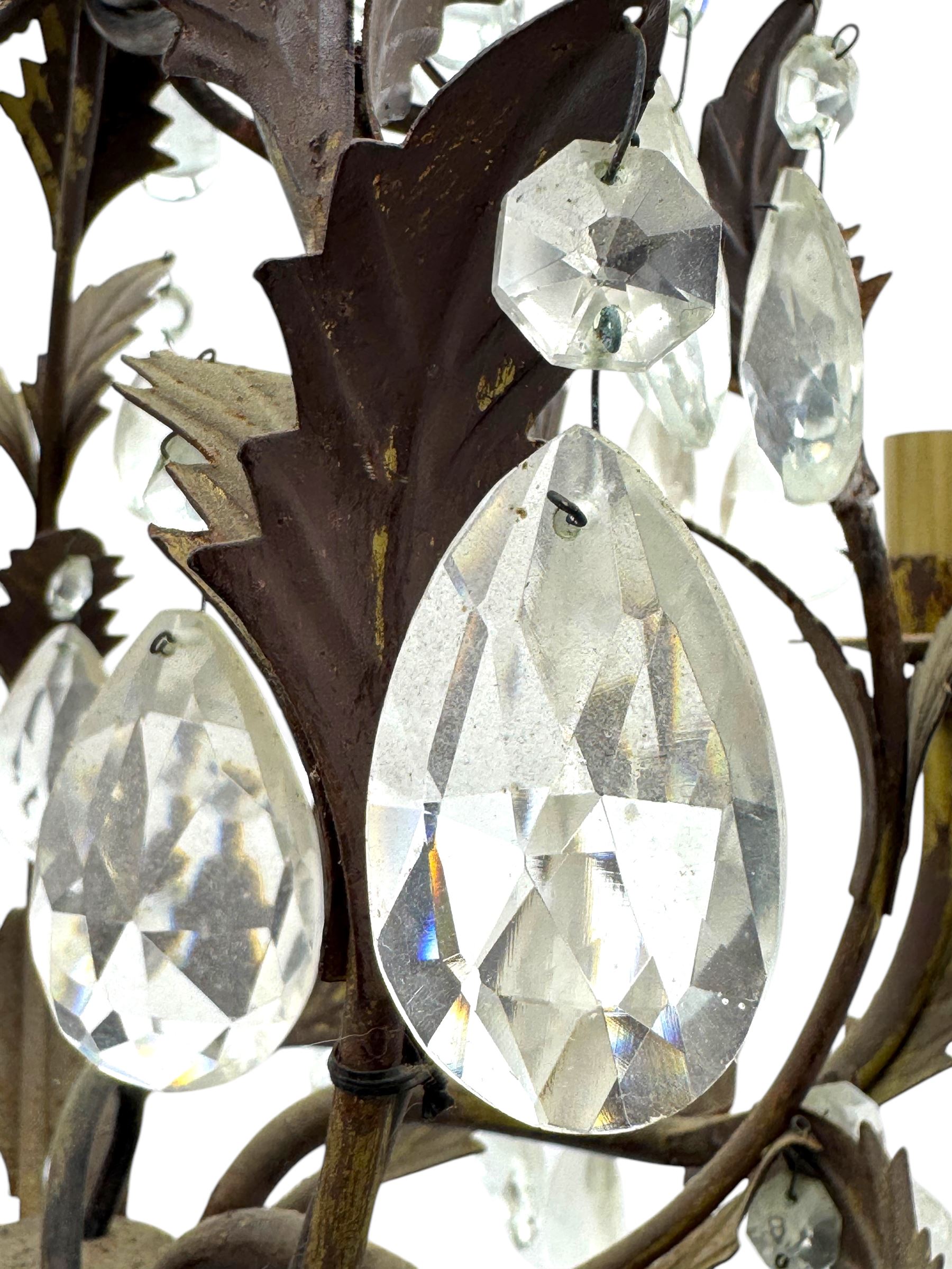 20th century distressed gilt tole chandelier, with six curved leaf clasped scrolling arms and frame, hung with lustre drops, approximately H50cm