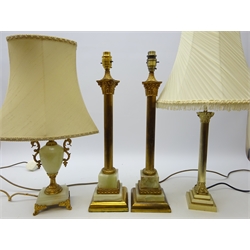  Pair oynx and gilt brass corinthium column table lamps, H45cm and two other similar style table lamps   