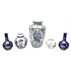 Chinese blue and white vase of baluster form decorated with lotus flowers, together with pair of Japanese vases with blossoming branches, Mason's blue and white lidded ginger jar, Royal Worcester Blue Dragon, all with marks beneath, largest H31cm (4)