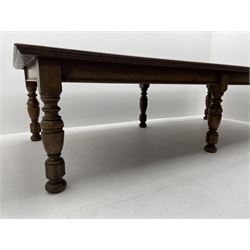 Large early 20th century oak boardroom table, rectangular moulded top on six turned and faceted supports 