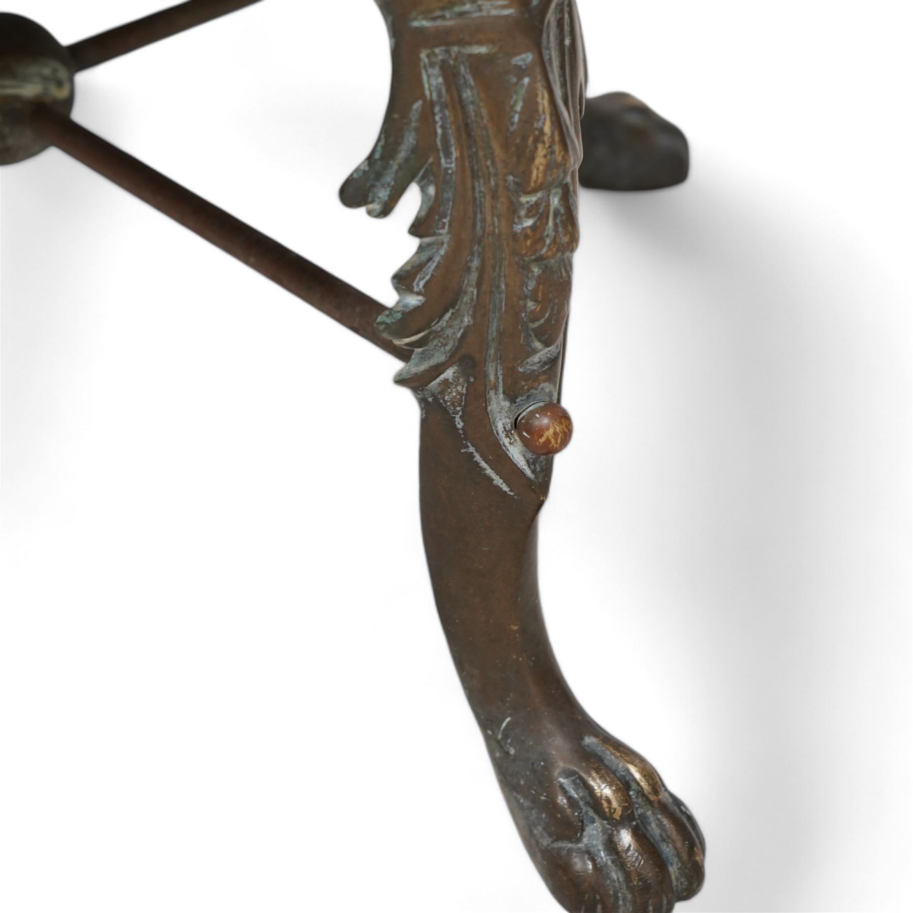 19th century copper and brass log basket, fitted with twin lion mask handles, raised on acanthus cast cabriole supports terminating to paw feet, united by X-stretcher