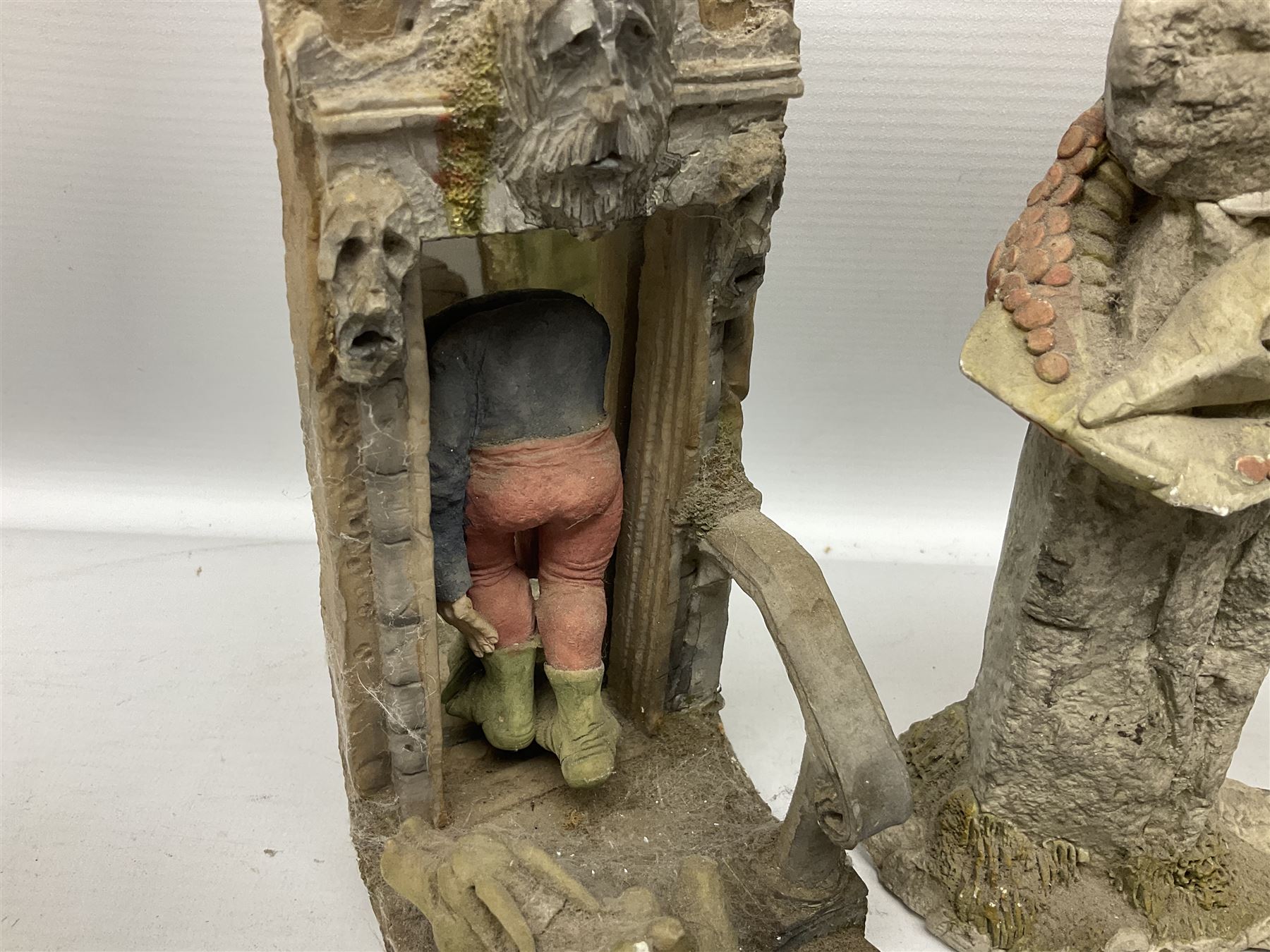 Seven Terry Pratchett Discworld figures by Clarecraft, to include The Luggage DW04M Smugli D990, pair of Home Sweet Home bookends, wall hanging modelled as a dragon upon stone plinth etc, tallest H19cm