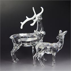 Two Swarovski figures, comprising Doe and Christmas Stag, both in original boxes 