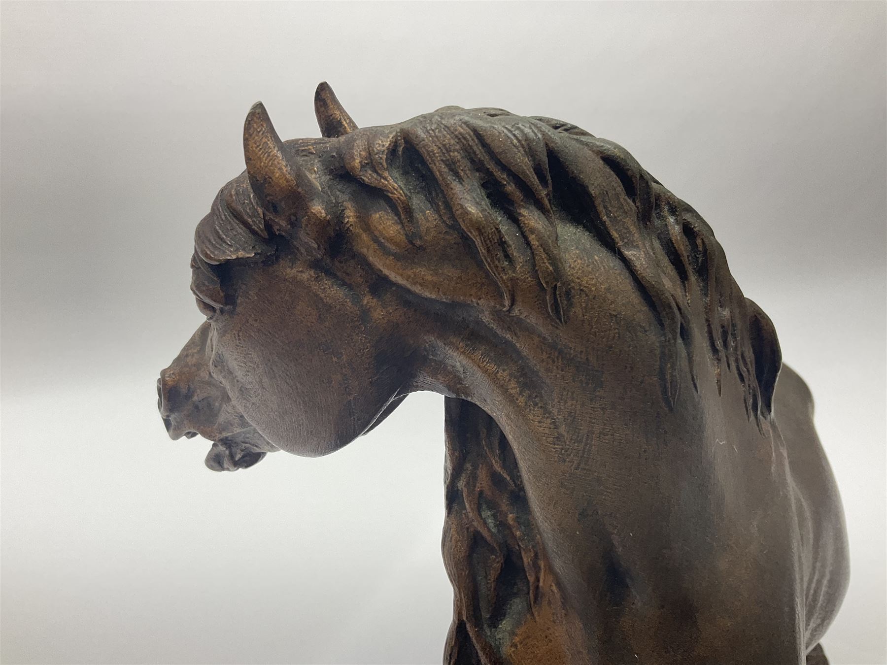 After P J Mene, bronze figure of a horse on a stepped oval base, H31cm 