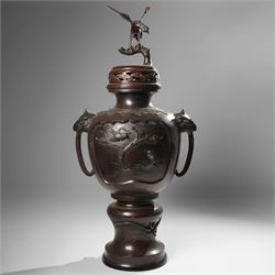 Japanese late Meiji period bronze koro and cover, surmounted by an eagle finial and with b...