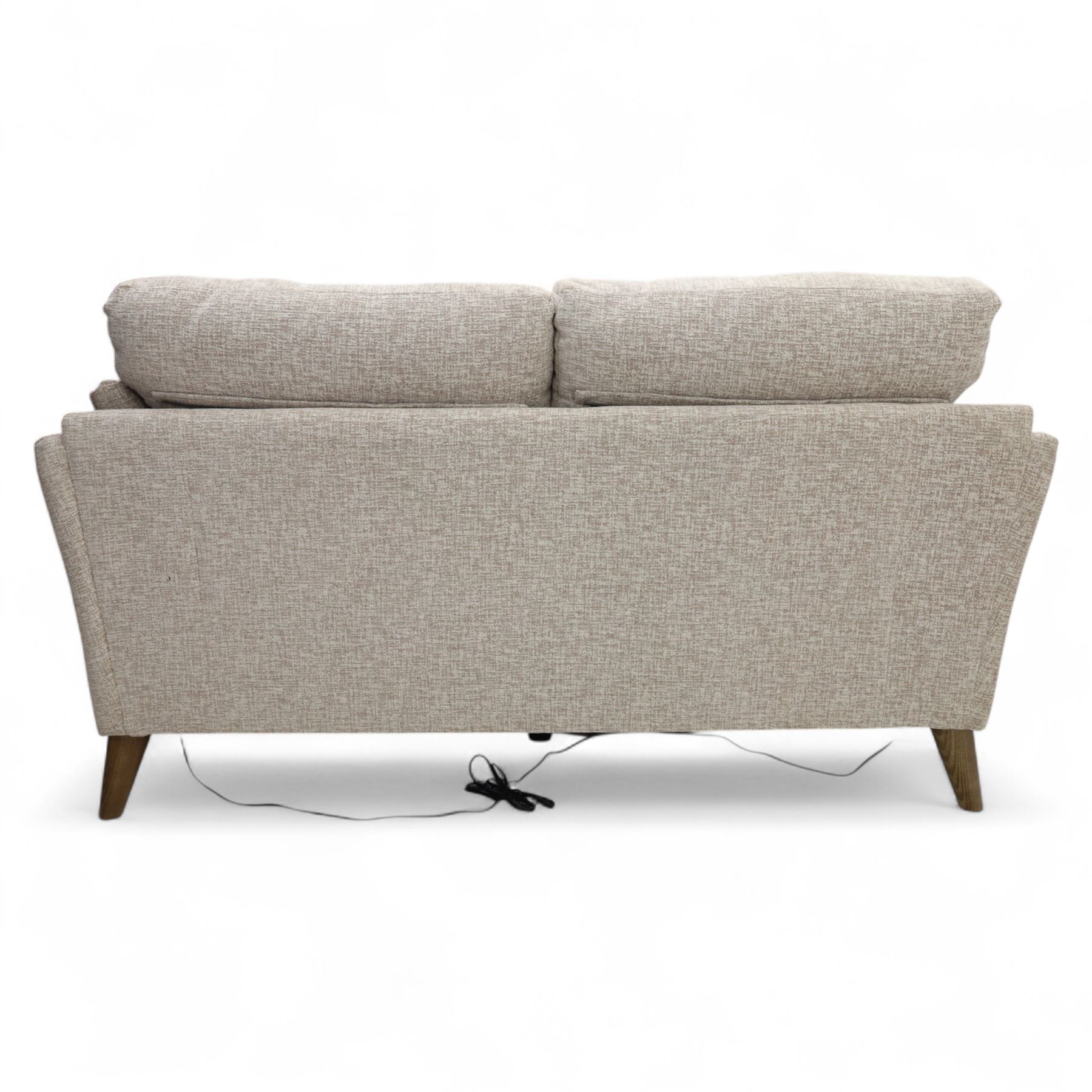 Ashwood - ‘Calypso’ 2-seater motion lounger, upholstered in light stone grey textured fabric with flared arms and split back cushions, fitted with dual electric recline controls, raised on stained tapering legs
