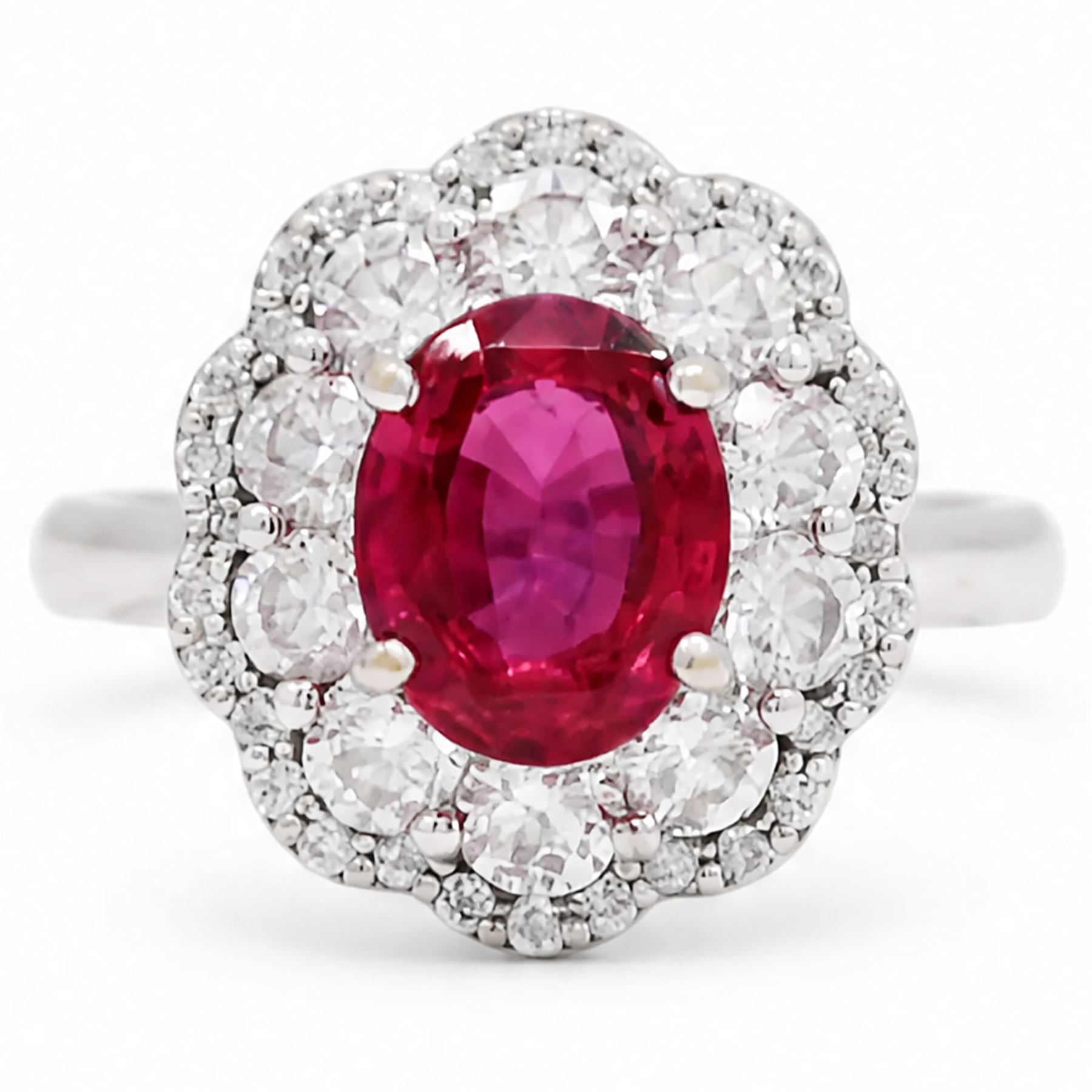 18ct white gold unheated oval ruby and round brilliant cut diamond cluster ring, hallmarked, ruby 3.07 carat, total diamond weight approx 1.65 carat, with WGI certificate