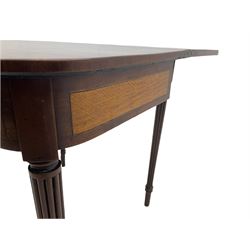 Early 19th century tea table, rectangular fold-over top with rounded corners, the frieze and sides inlaid with satinwood panels, double gate-leg action base, on reeded supports 