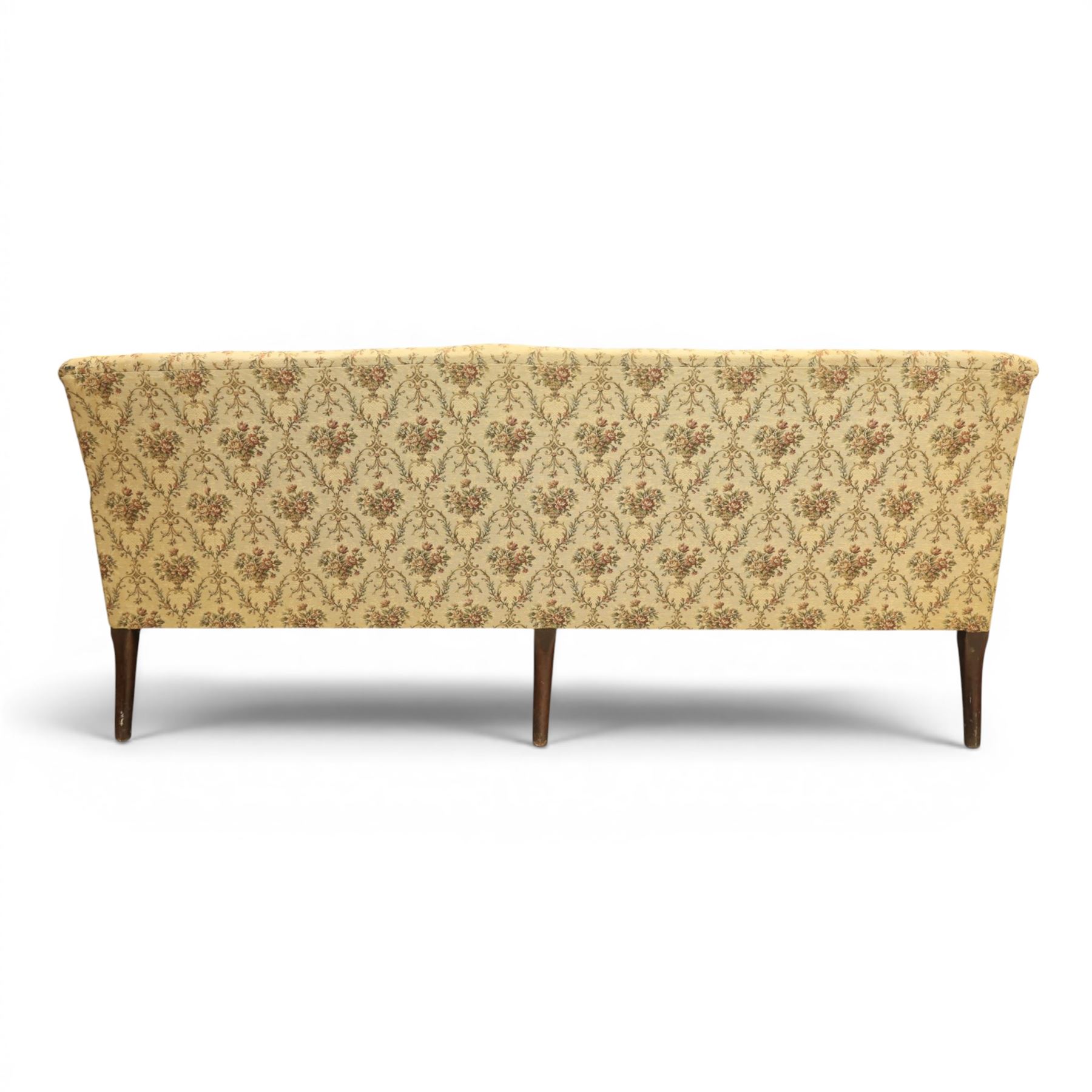 George II mahogany framed settee, beige foliate upholstery with padded sides, downswept arms with sprung seat and back, raised on six turned supports