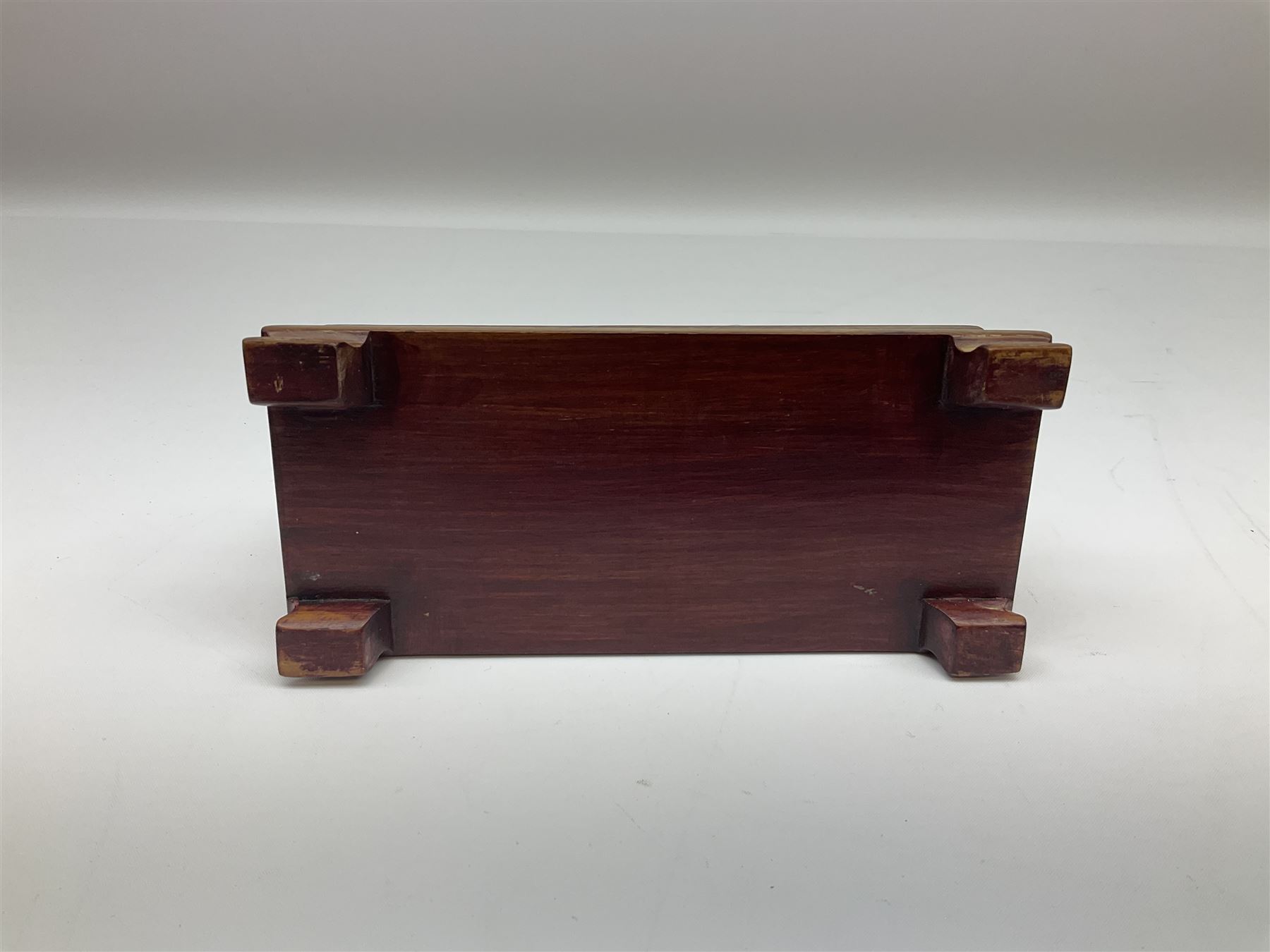 Japanese parquetry puzzle box L12cm; another Japanese puzzle box with marquetry top of Mount Fuji; eleven graduated Chinese figures including immortals; and Chinese figure of a lady standing on a hardwood base next to a horn table (14)