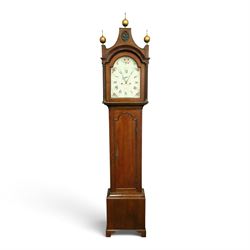 John Hall of Beverley - George III oak eight-day longcase clock, the painted arched dial with subsidiary seconds and date aperture, floral decoration, the case with pagoda top, pierced fretwork panel, brass ball finials, fluted pilasters and arched trunk door