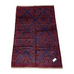 Persian Baluchi blue ground rug, decorated with geometric lozenges