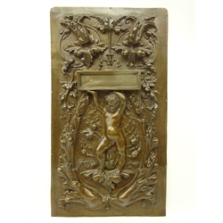  Renaissance style bronzed repousse plaque, depicting a cherub surround by oak leaves below two mythical fish, H49cm x W28cm  
