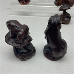 Seven carved netsukes, to include koi carp, owl, rat, toad etc 