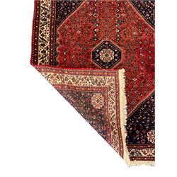 Fine Persian blue and red ground woollen rug