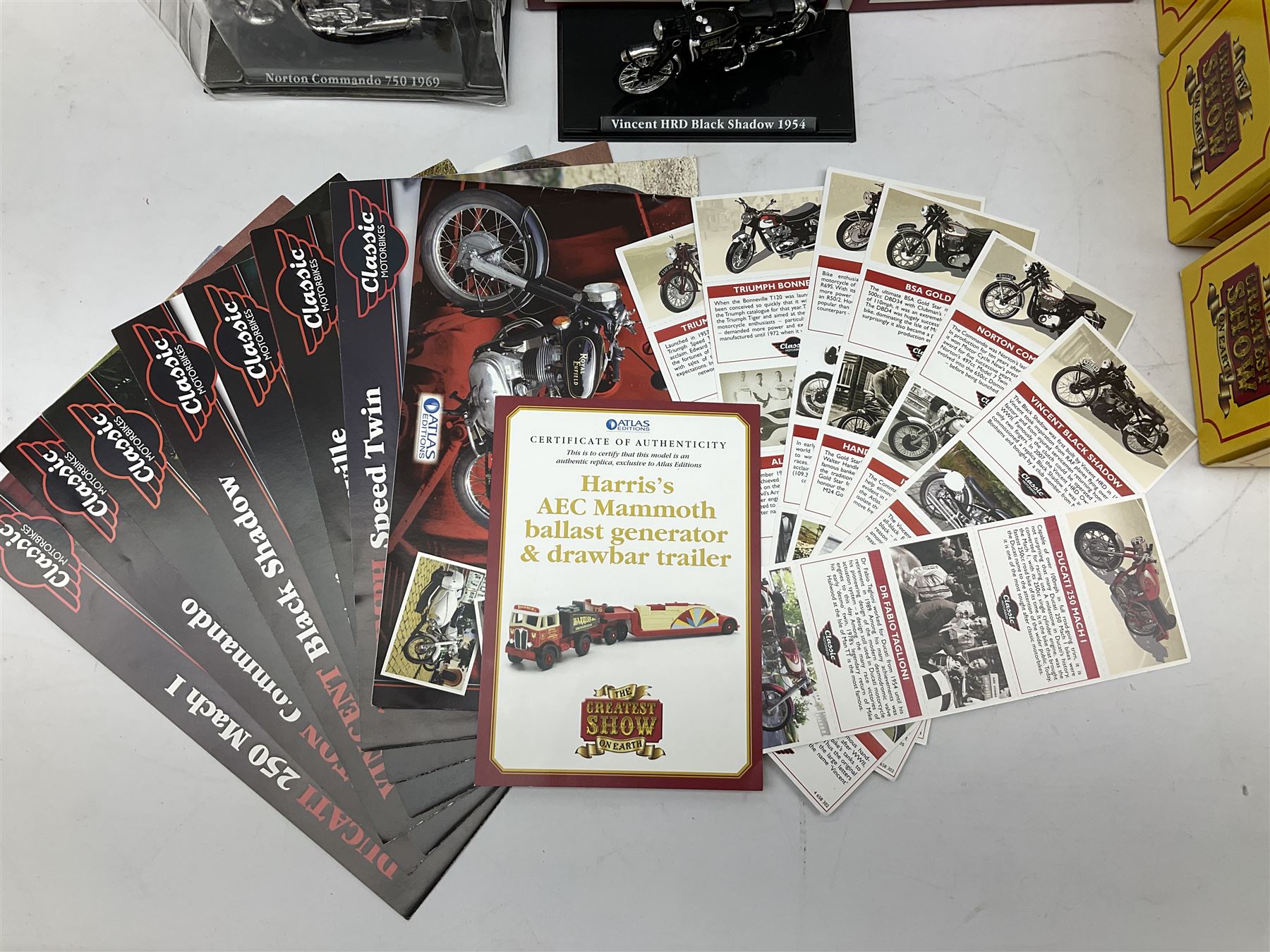 Atlas Editions - eight 'The Greatest Show on Earth' vehicles; all boxed; and seven Classic Motorcycles; four boxed, two in inner packaging and one unboxed; together with associated paperwork